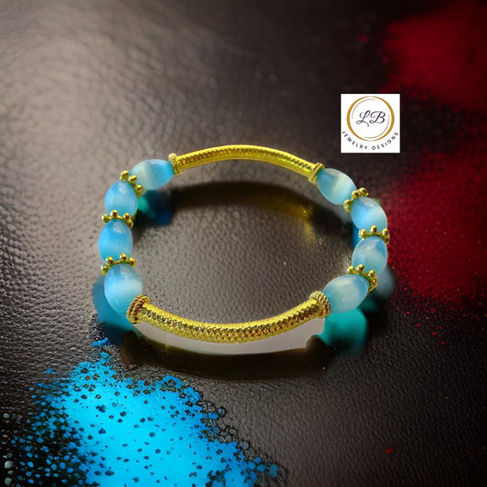 Blue Mexican Fire Opal Gemstone Gold Bali Tube Bracelet