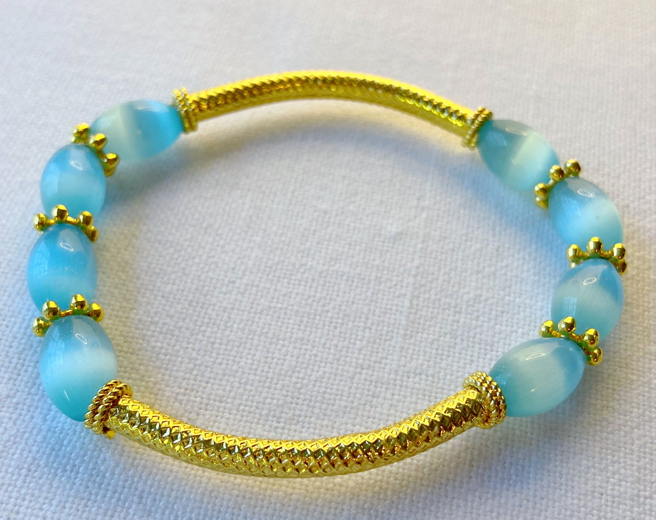 Vibrant Blue Mexican Fire Opal Gemstones and 18k Gold Vermeil Bracelet