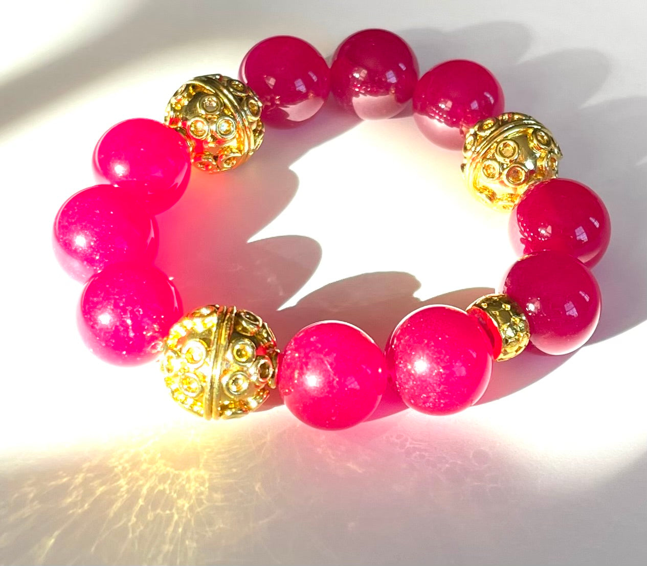 Rose Ruby Quartz Gemstones and Ornate Gold Bali Beaded Bracelet